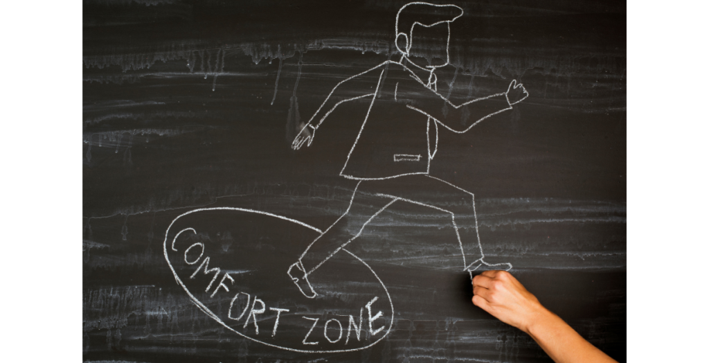 Professional stepping beyond comfort zone to overcome limiting beliefs