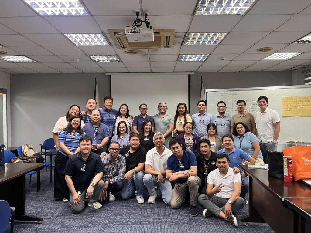 Full group celebratory photo at the end of the two-day training