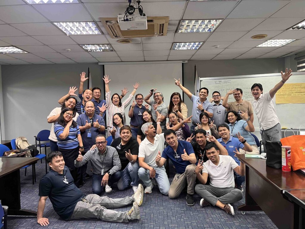 Group photo of Advantek PH management team smiling and posing together at the end of training